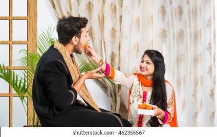 indian-brother-sister-enjoying-celebrating-260nw-462355567