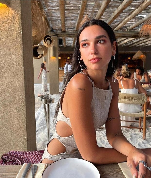 Dua-Lipa-serves-bold-look-in-white-cut-out-bodycon-dress-by-Courrèges-in-Albania-4.jpg
