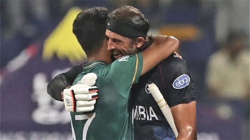 Haris Rauf and David Wiese hug each other after the game
