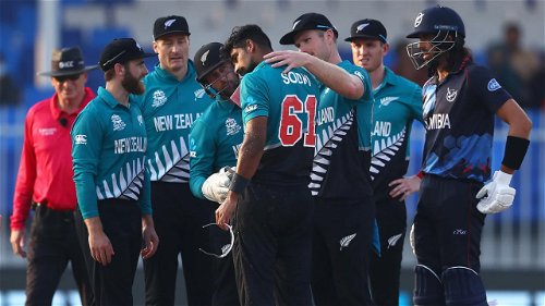 Ish Sodhi is congratulated after getting the wicket of Gerhard Erasmus
